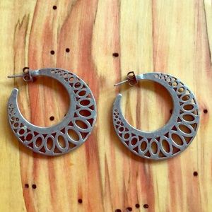 Medium decorative silver tone hoops